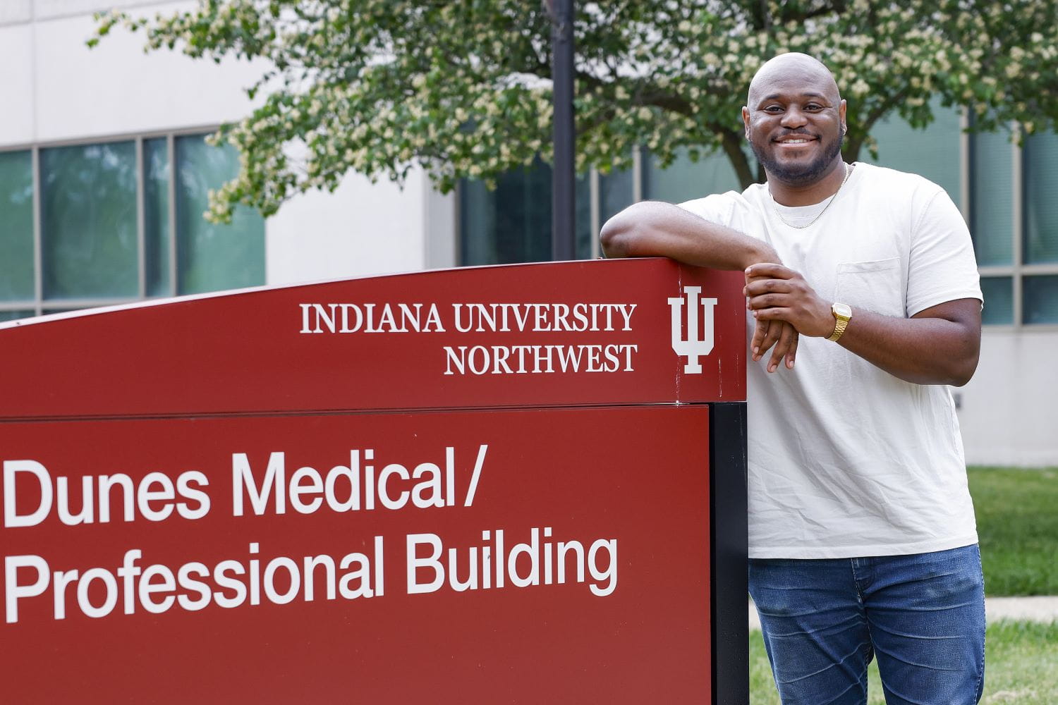 GIONTÉ MASON standing in front of IU Northwest Sign