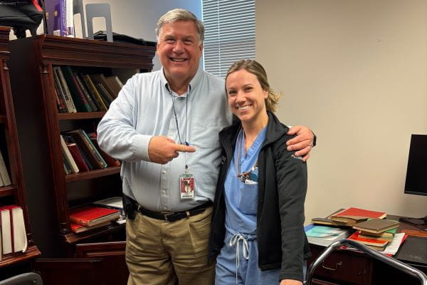 William Wooden pictured alongside a surgery trainee. | Photo courtesy William Wooden