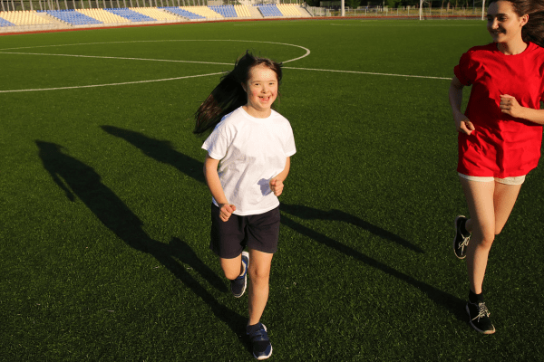 A young girl trains for the Special Olympics. 