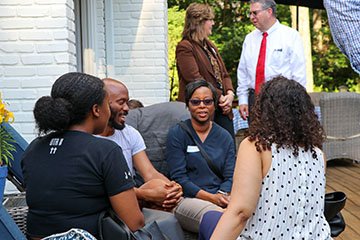 Faculty and students at outdoor gathering
