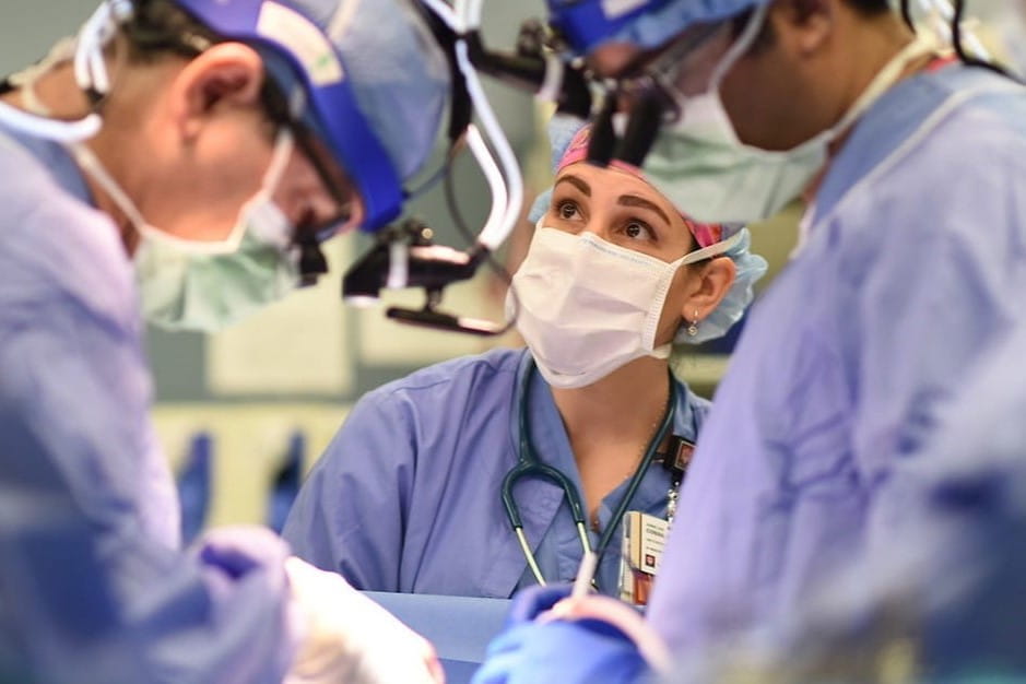 Surgeons in scrubs in operating room