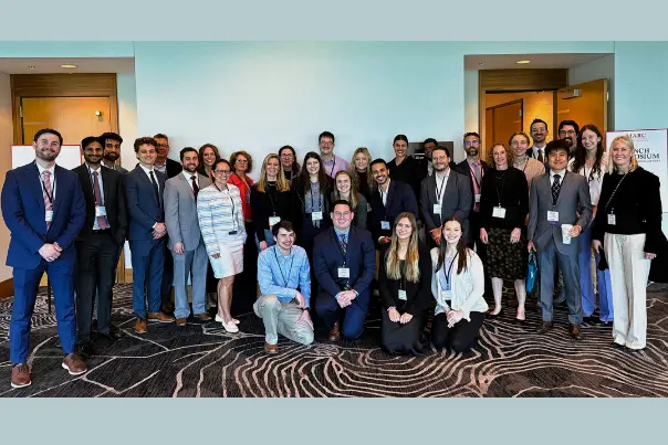 a large group photo of anesthesia residents at a professional event