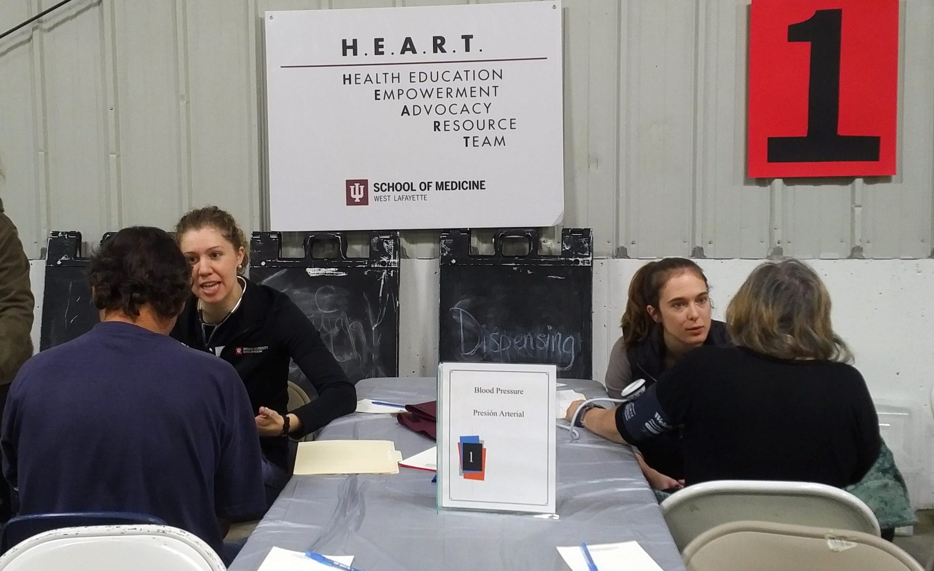 Christy Waterman (MS4) and Amanda Hornbach (MS3) educate on the impact of hypertension.