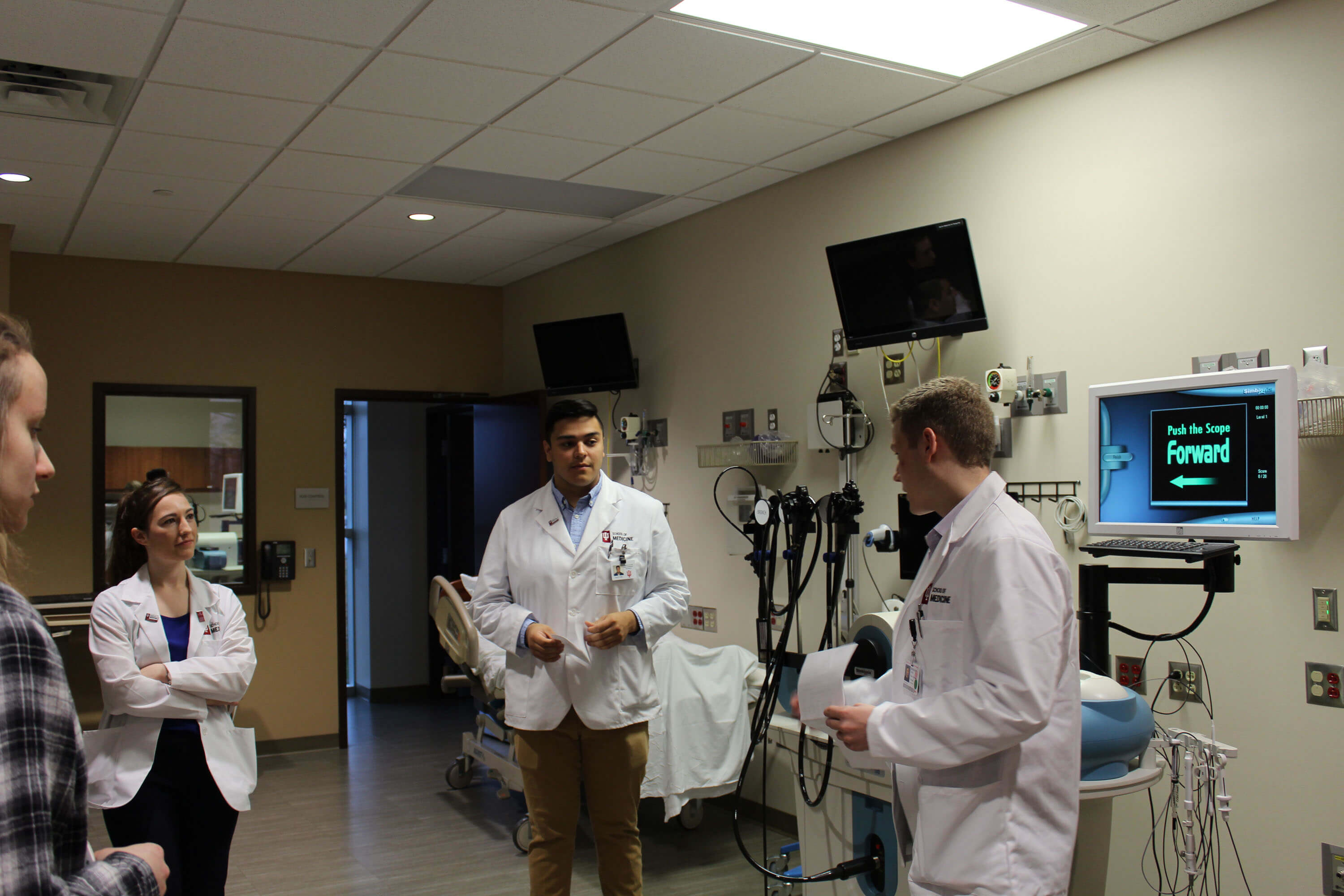 Medical students teaching high school students at MedExpo