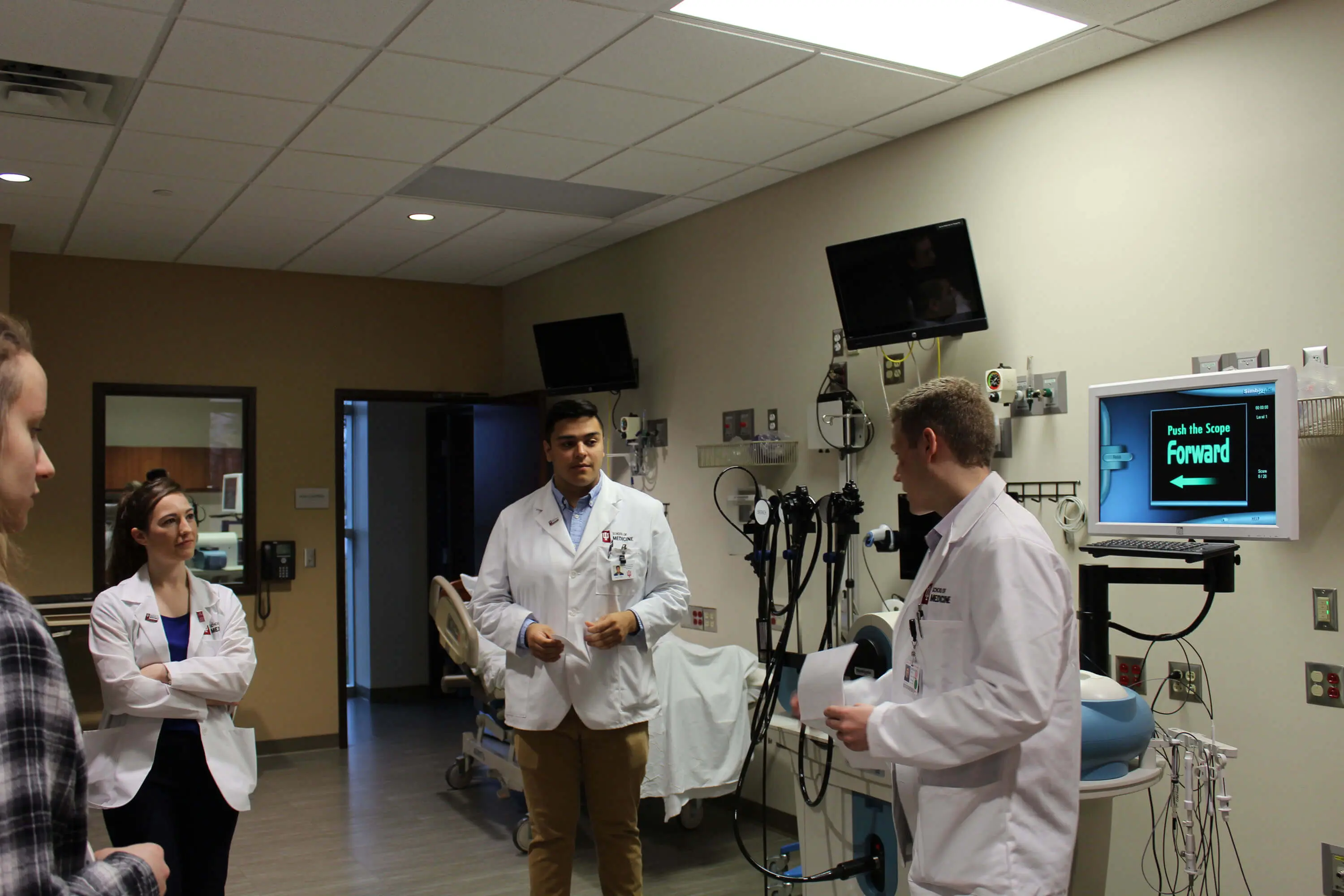 Medical students teaching high school students at MedExpo