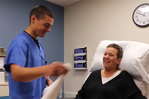 Julie Neighbours with physical therapist