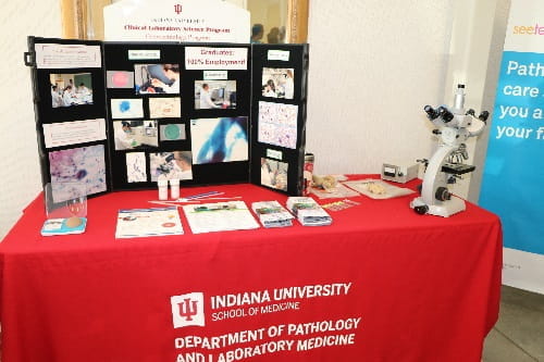 A display table with various educational materials at a past See, Test and Treat event 