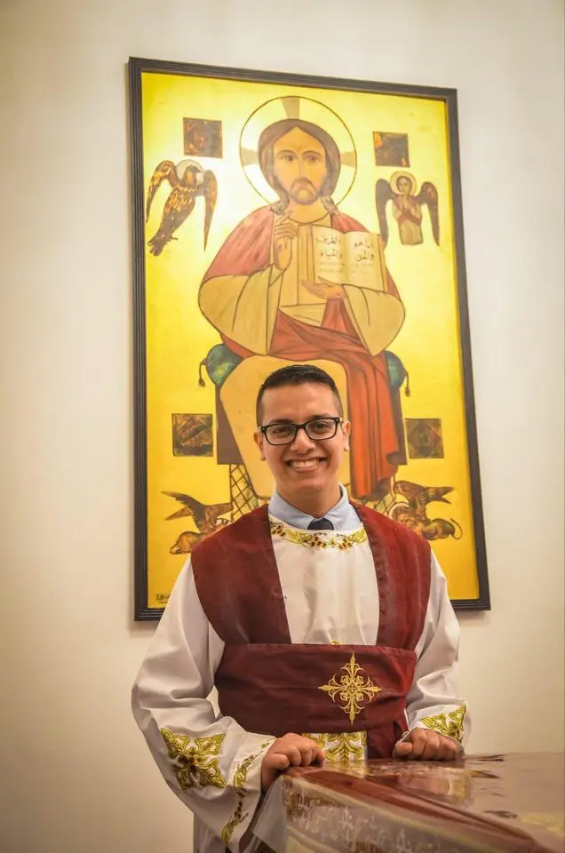 Alabd dressed as a deacon for his church’s Easter mass in 2019