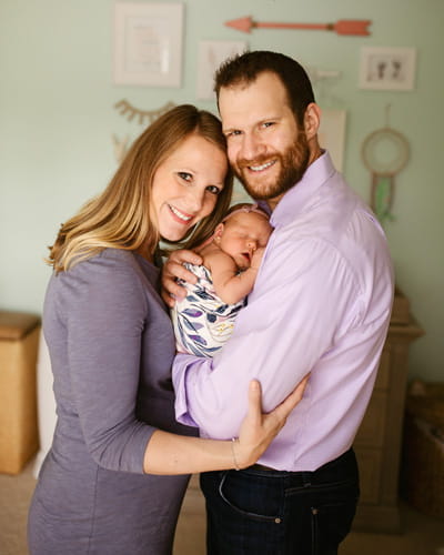 Dr. Ashley Satorius and Dr. Matt Rutz, dual IUEM physician faculty, with their daughter Raegan.
