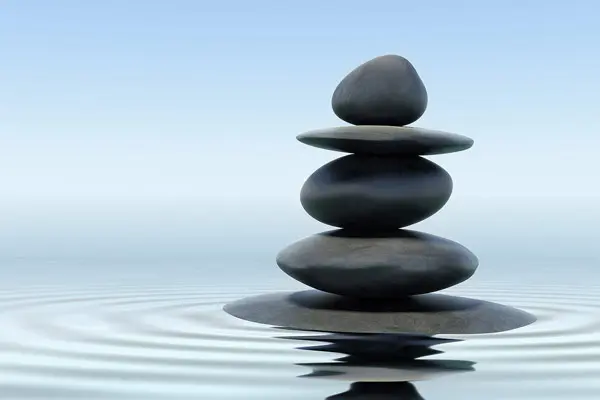 rocks balanced on water