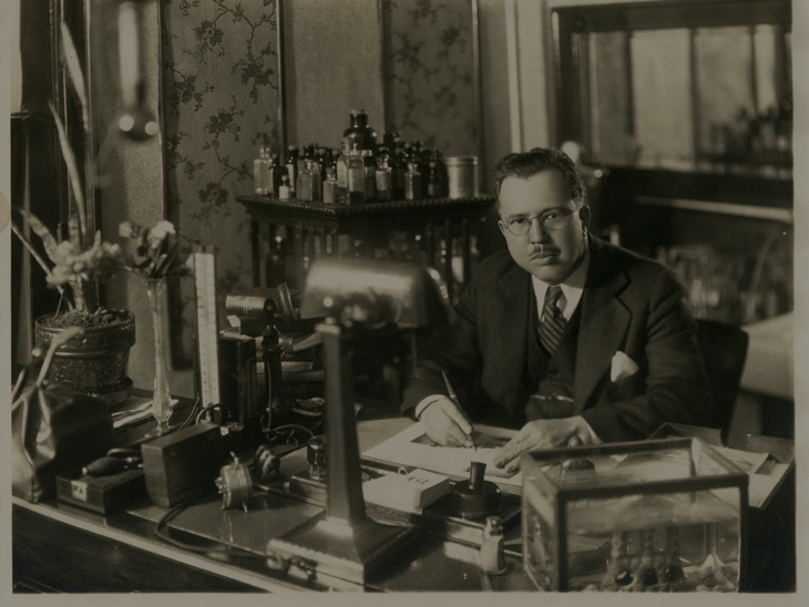 Clarence Lucas, Sr., MD at his office desk