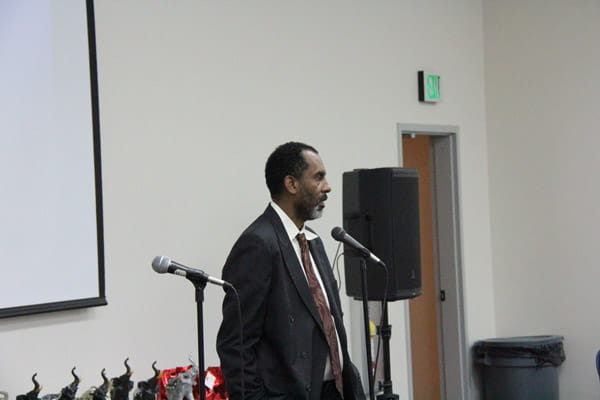 Clark Simons MD speaks at a community event