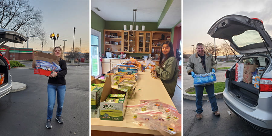 internal medicine staff and family members work on donated goodie bags