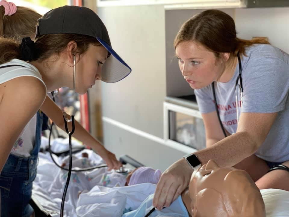 Emma Eckrote facilitates a learning opportunity at Mollie Wheat Clinic in Terre Haute