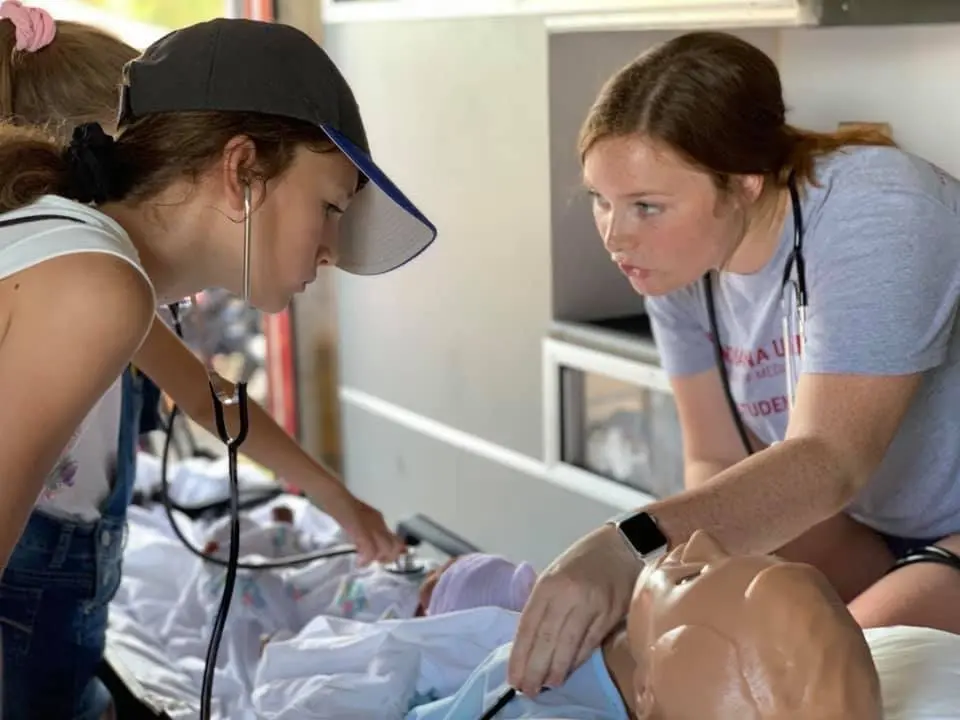 Emma Eckrote facilitates a learning opportunity at Mollie Wheat Clinic in Terre Haute