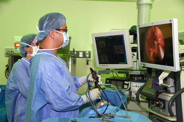 Jonathan Ting at work in the operating room