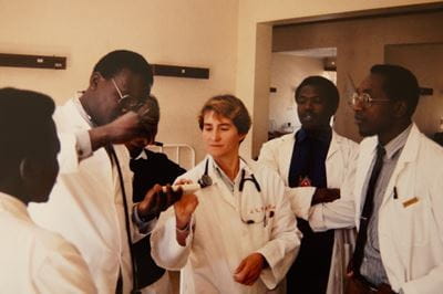 Kara Wools-Kaloustian works with a team of physicians in Kenya