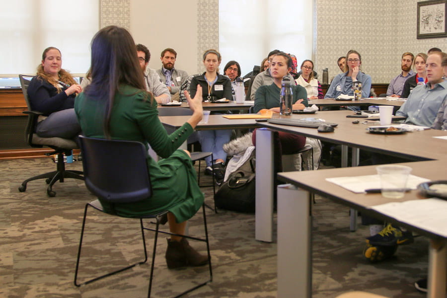 New residents listen to a presenter at a recent half-day conference