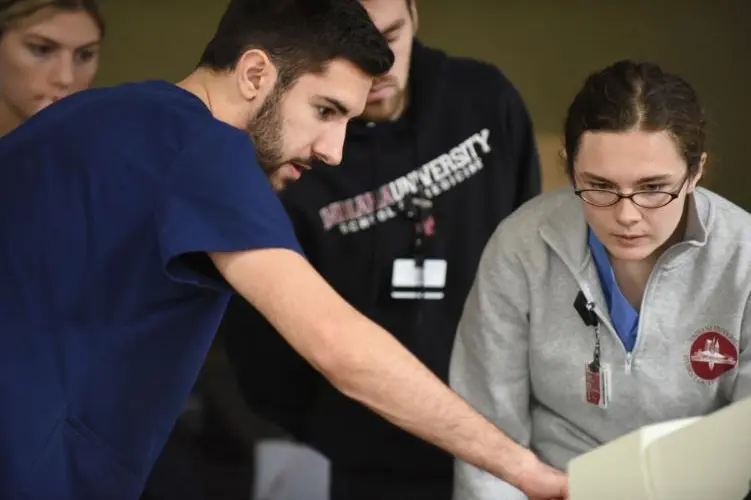melanie scheive working in the clinic