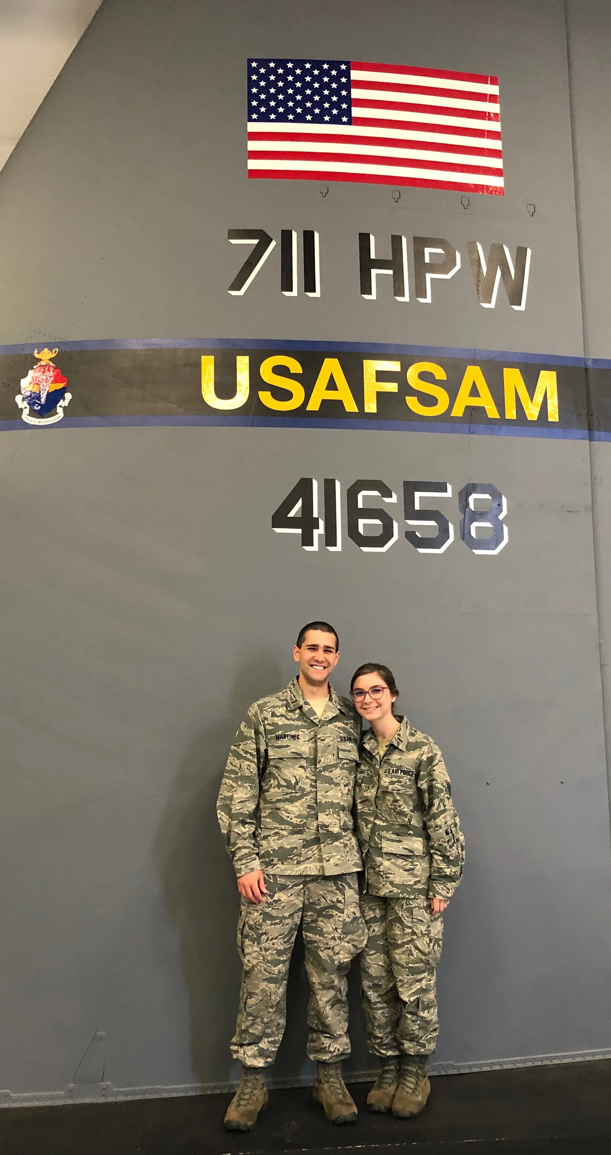 Carlos and Sarina in uniform