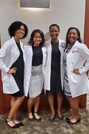 Fauntleroy with co-interns at IUSM