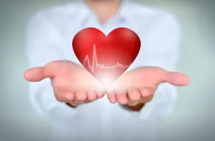 Hands holding heart