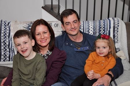 Chrissy Quenichet with family