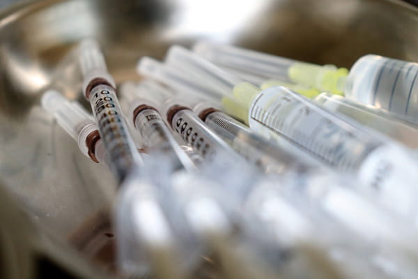 a pile of syringes