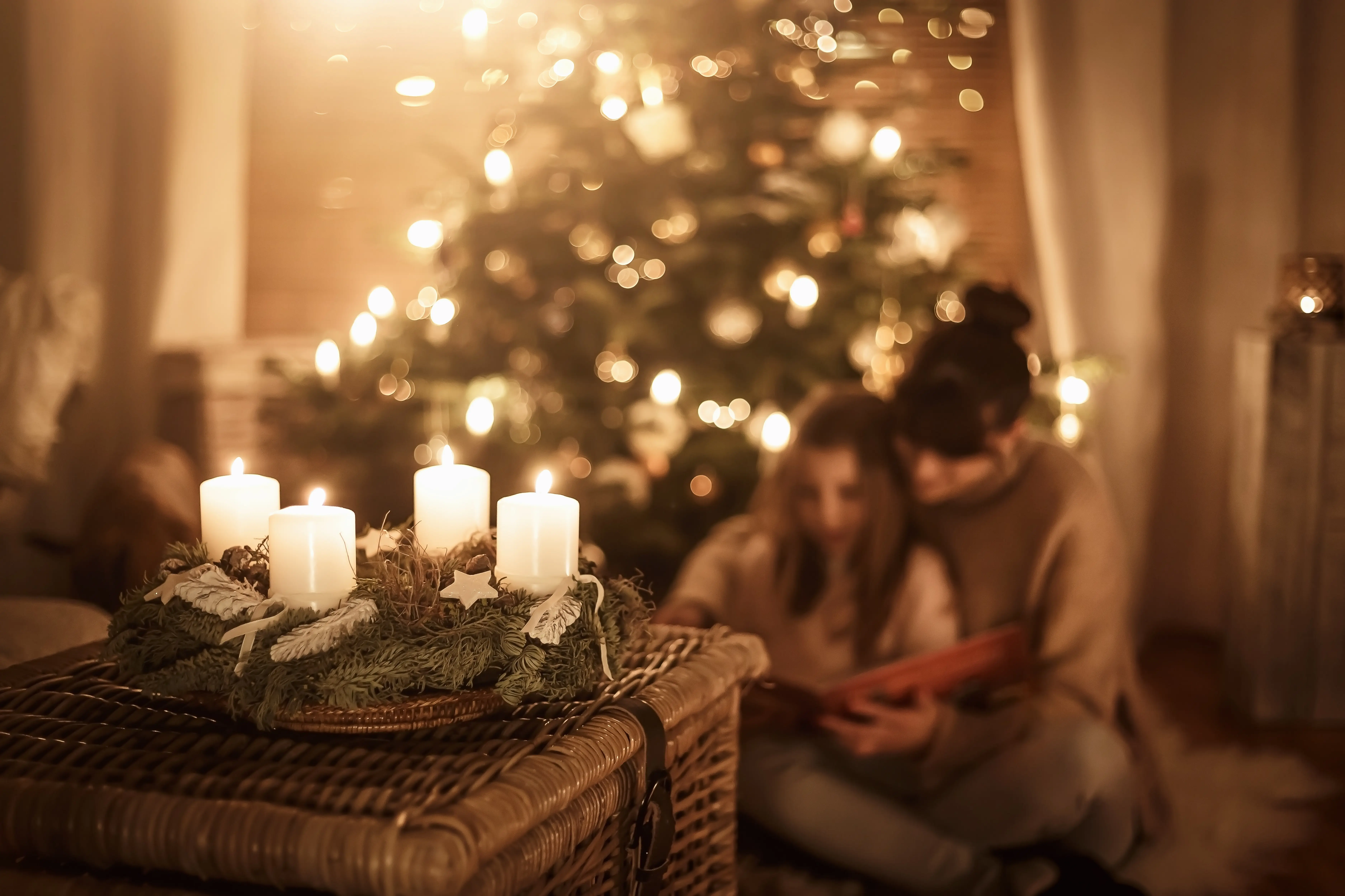 Parent and child with advent wreath