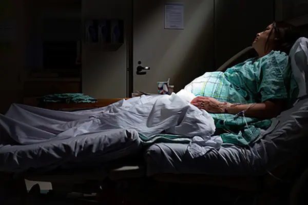 Adobe Stock Photo of pregnant woman in Hospital bed