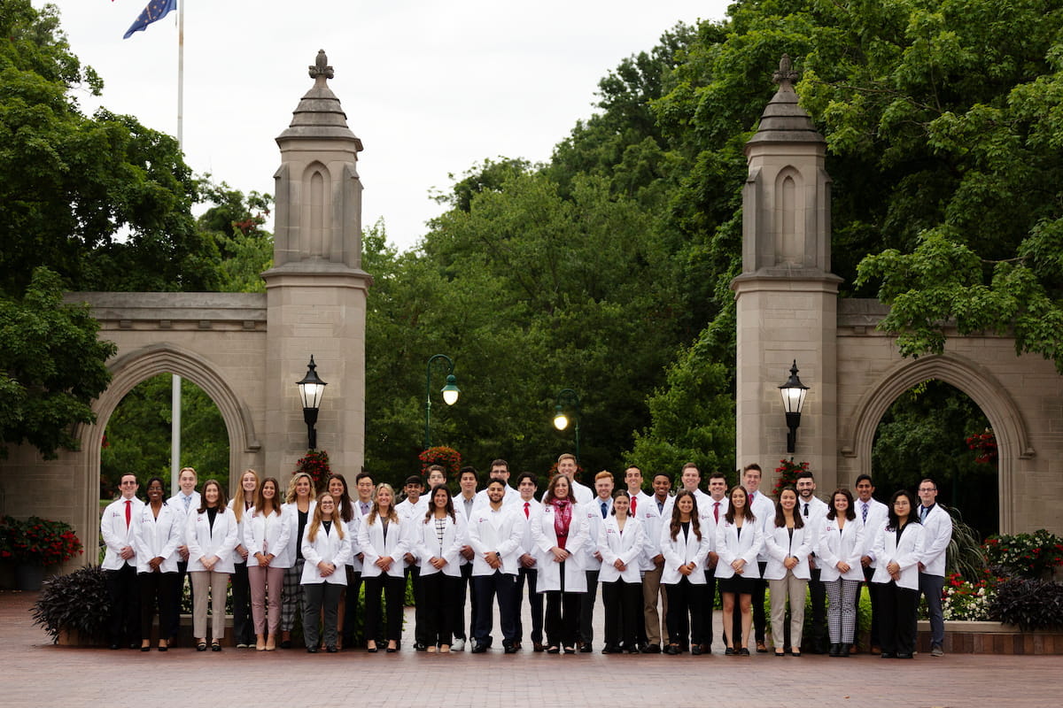 Katherine Hiller with the Class of 2026 at the Sample Gates in Bloomington
