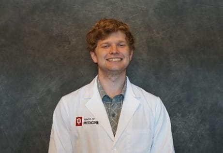 John Quentin Deckbar in white coat