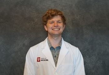 John Quentin Deckbar in white coat