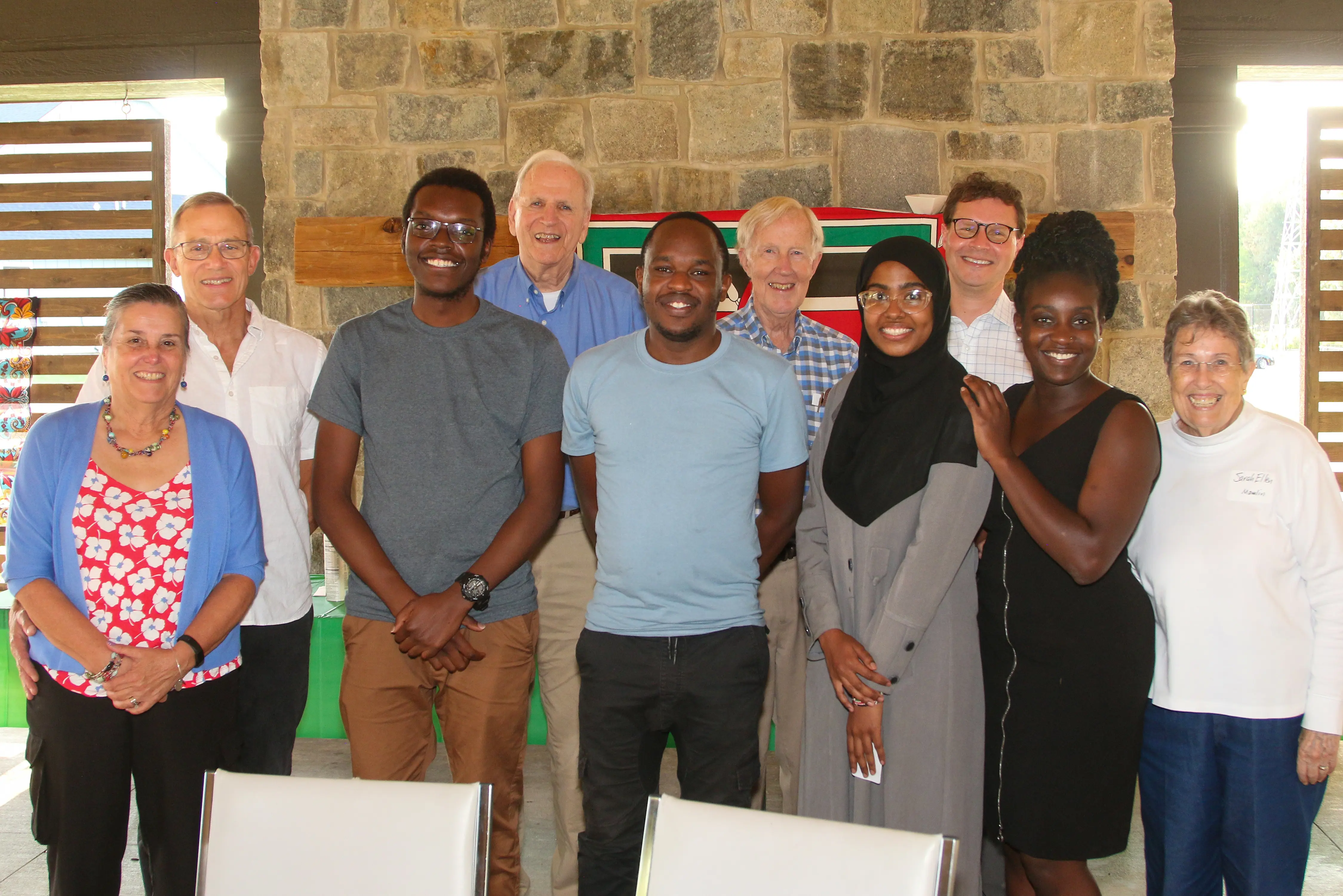 Kenyan medical students Anthony Kibet, Kevin Kipruto, Aisha Bereki and Wendy Matendechele with Bob and Lea Ann Einterz, Joe Mamlin, Charlie Kelley, Adrian Gardner and Sarah Ellen Mamlin