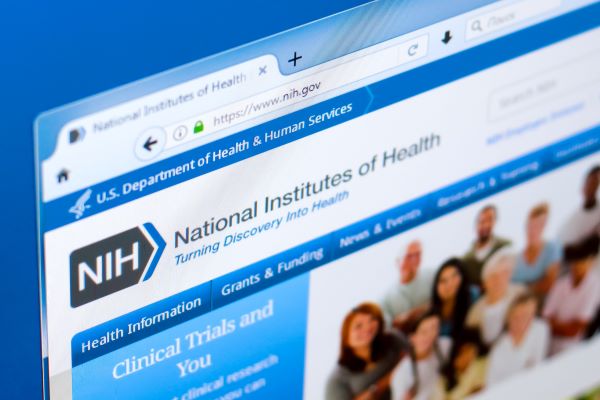 Webpage open against a blue background, showing the National Institutes of Health (NIH) website (nih.gov)