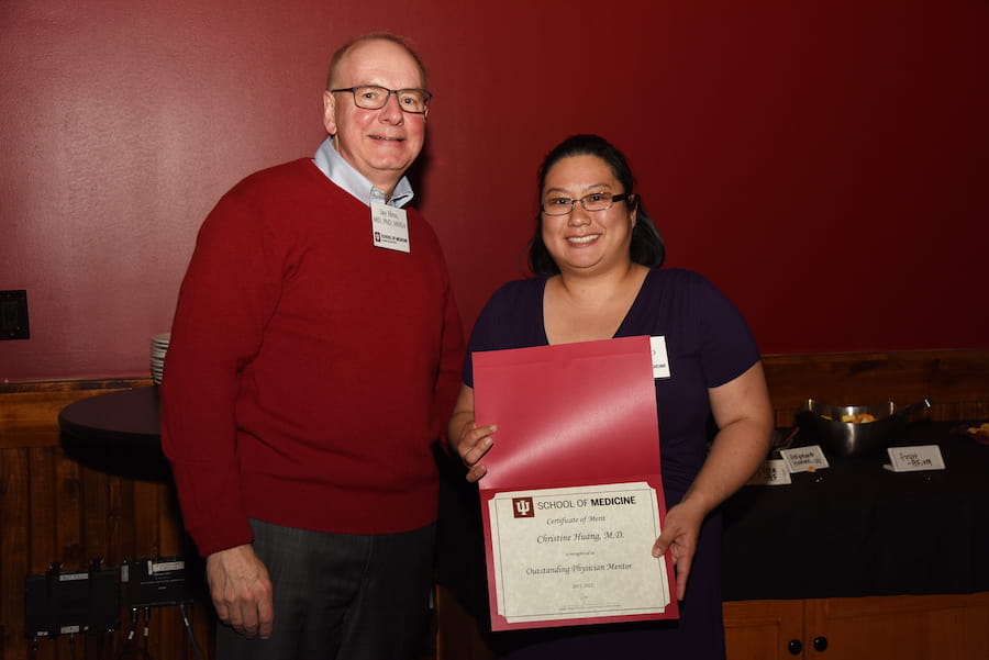 Dean Jay Hess and Christine Huang, MD with award