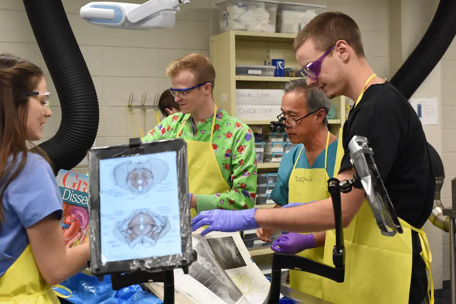 Dr. Duong and students in anatomy