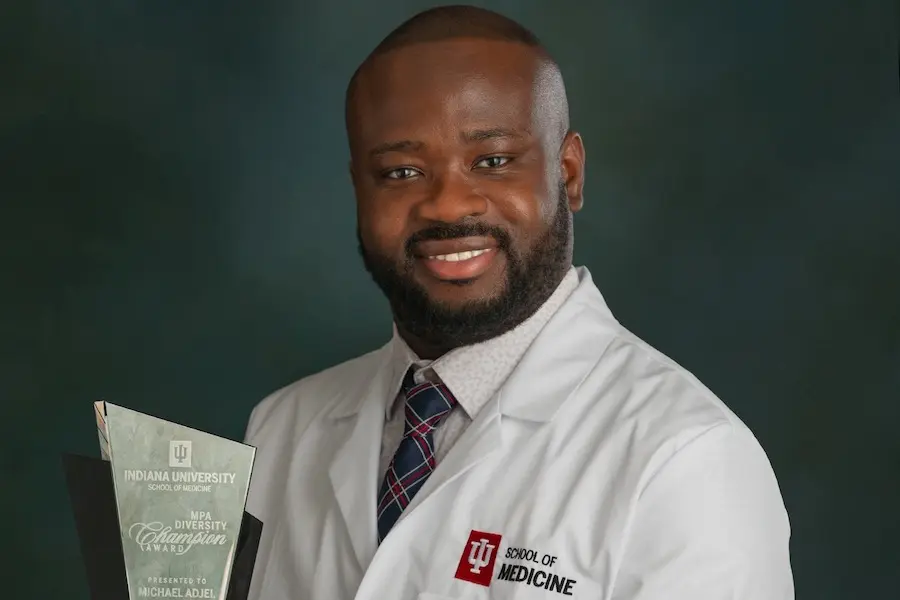 Michael Adjei with Diversity Champion award