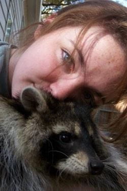 Geddes with a raccoon