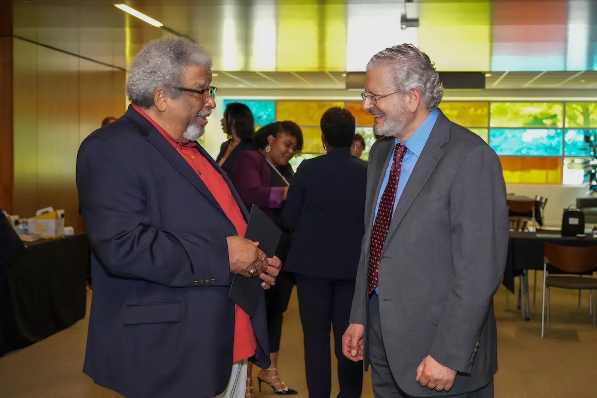 Saykin talks with Ralph Richards of the Community Advisory Board