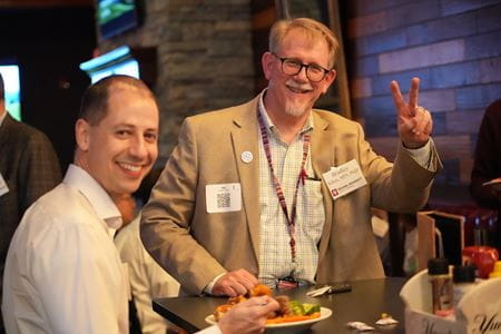 Brad Allen mingles at the 2023 Physician Mentor reception where he was named an Outstanding Physician Mentor. | Photo by Tim Yates, IU School of Medicine Brad Allen at Physician Mentor reception