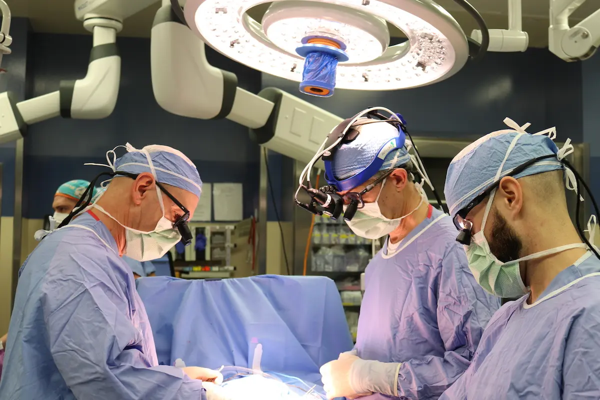 Dr. Rink leads surgery in the operating room.