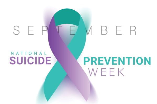 purple and teal ribbon with September National Suicide Prevention Week in purple and teal text