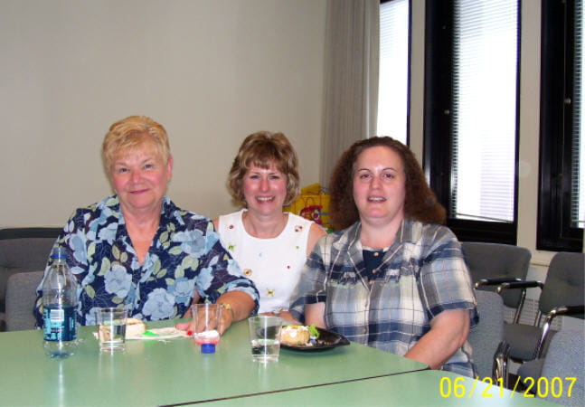 Marilyn Baker sits with coworkers Glenna Guthrie and Allison Lynch for a casual lunch in a photo dated 06/21/2007.
