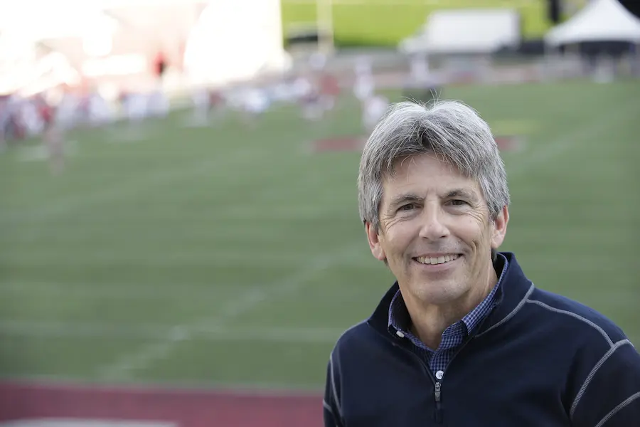 Thomas McAllister portrait, overlooking a football field