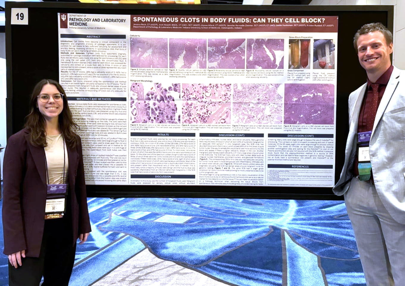 Jessica Rech and Josh Howell in front of their poster