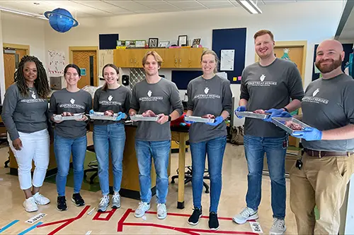 Evansville med students at Cedar Hall Community School.