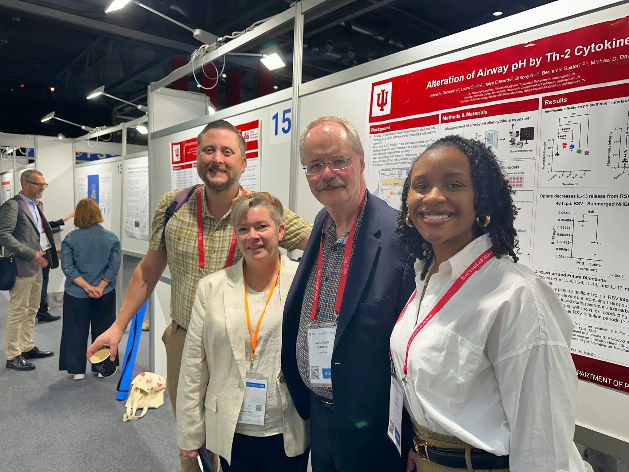 Members from the Gaston Laboratory huddled together in front of Ivana Daniels’ research poster at the European Respiratory Society (ERS) Congress in Vienna, Austria on September 9, 2024. From left to right: Michael Davis, PhD, Laura Smith, Benjamin Gaston, MD, and Ivana Daniels. 