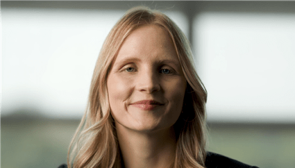 Video still of Dr. Laura Vater, white woman with long blonde hair
