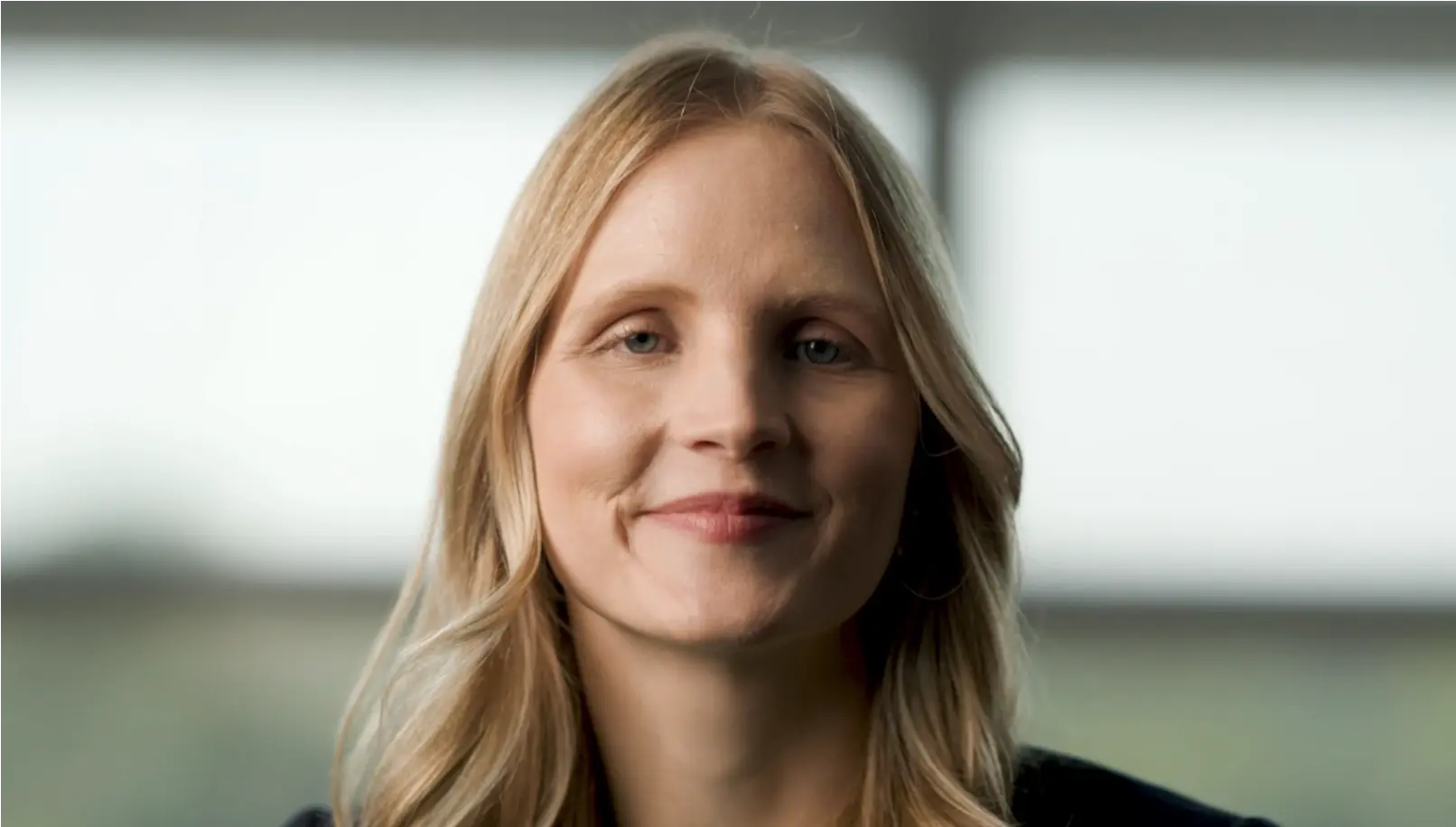 Video still of Dr. Laura Vater, white woman with long blonde hair